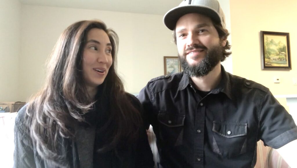 man and woman smiling as they discuss DIY demo renovations