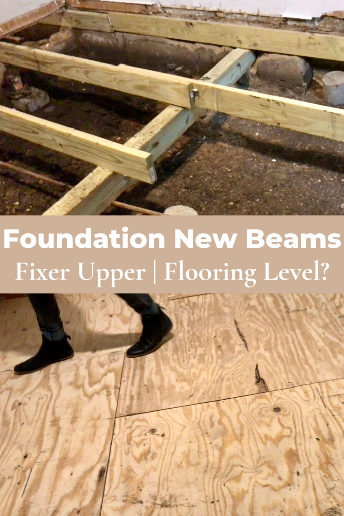 pier and beam foundation with new wood beams and man walking on plywood foundation