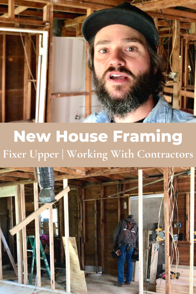 man with framing behind him exposed in fixer upper and contractors in background working on framing