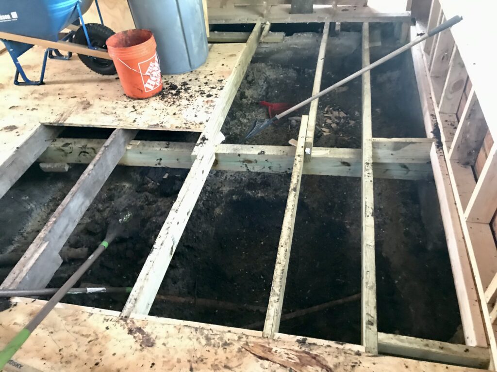 foundation frames exposed and soil being dug out