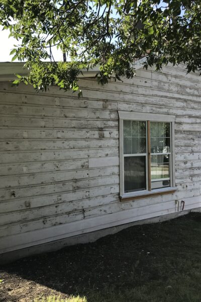 old cottage with original siding
