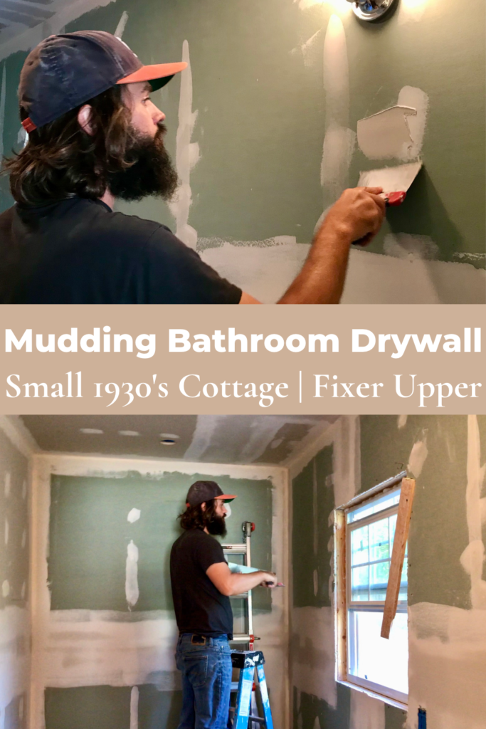 man mudding drywall in bathroom