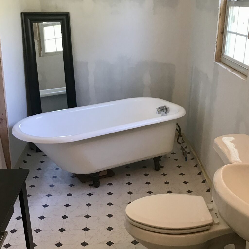 antique clawfoot tub in bathroom