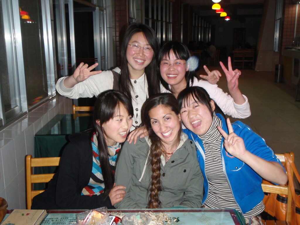 several young women smiling together
