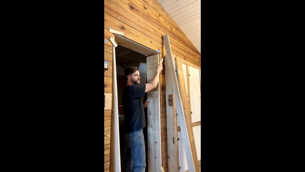 man building custom door jambs for vintage doors