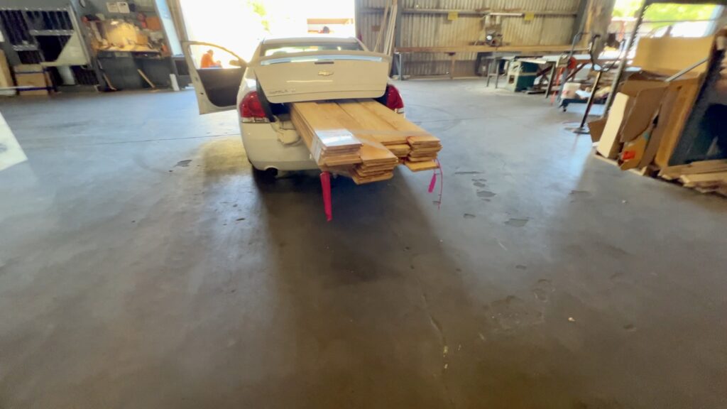 man buying new shiplap